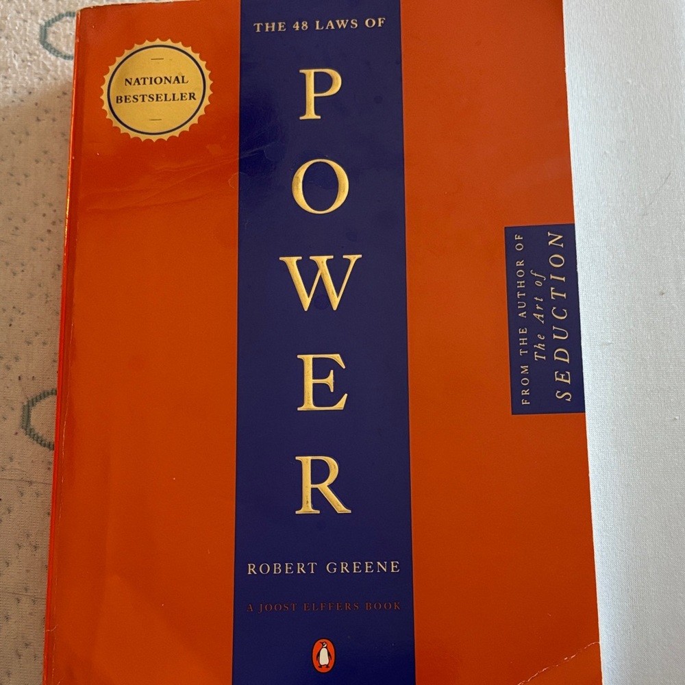 The 48 Laws of Power by Robert Greene - Orange Cover